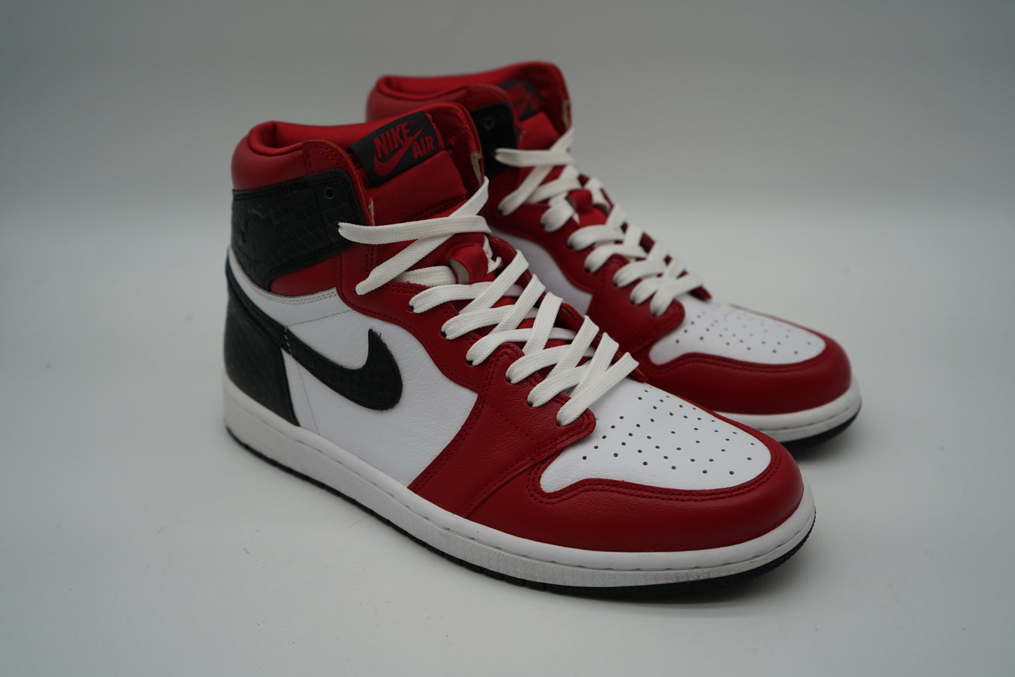 Jordan 1 Retro High Satin Snake Chicago (Women's)